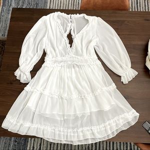 White long sleeve open back dress